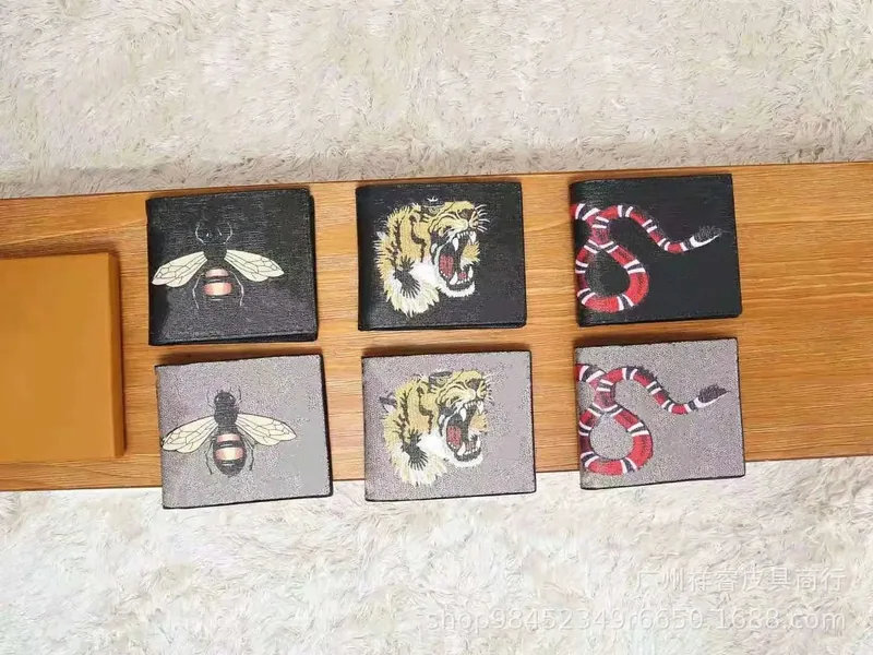 Gucci Animal Print Wallets