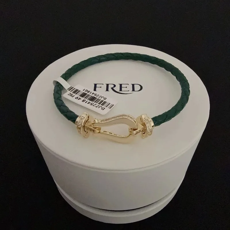 Fred braided cord bracelet gold horseshoe clasp