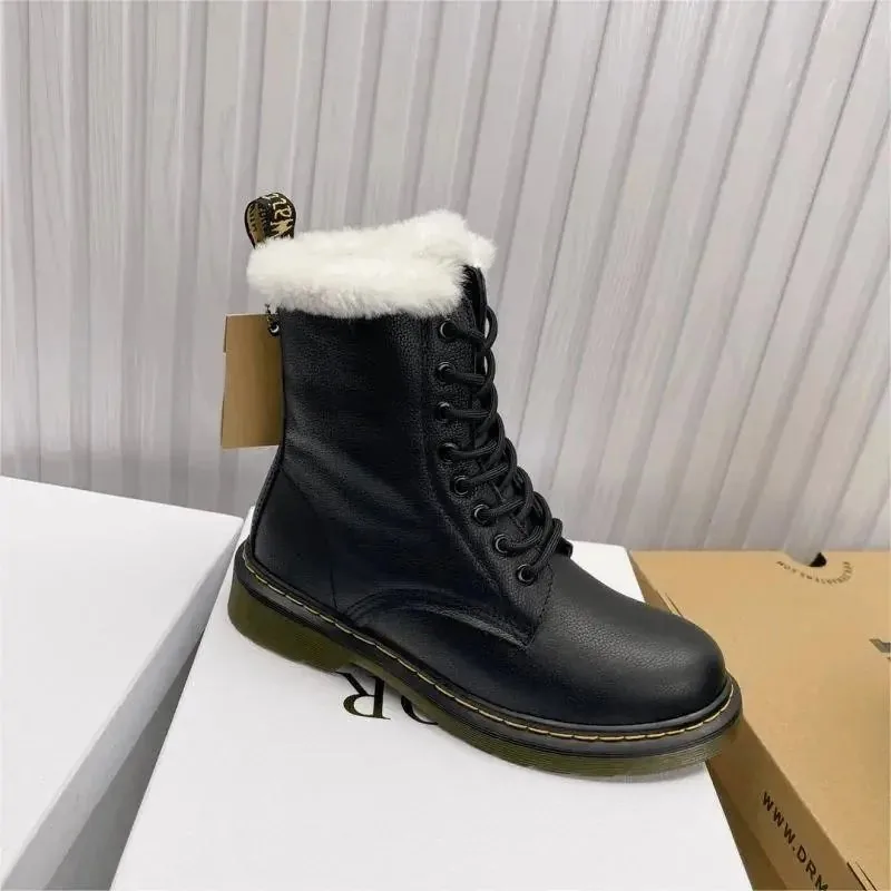 Dr. Martens black leather lace-up boots with faux fur lining