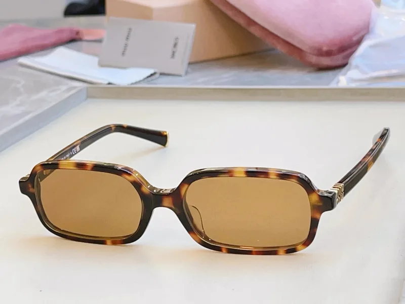 Miu Miu SMU 11Z-F Sunglasses 52-15-140