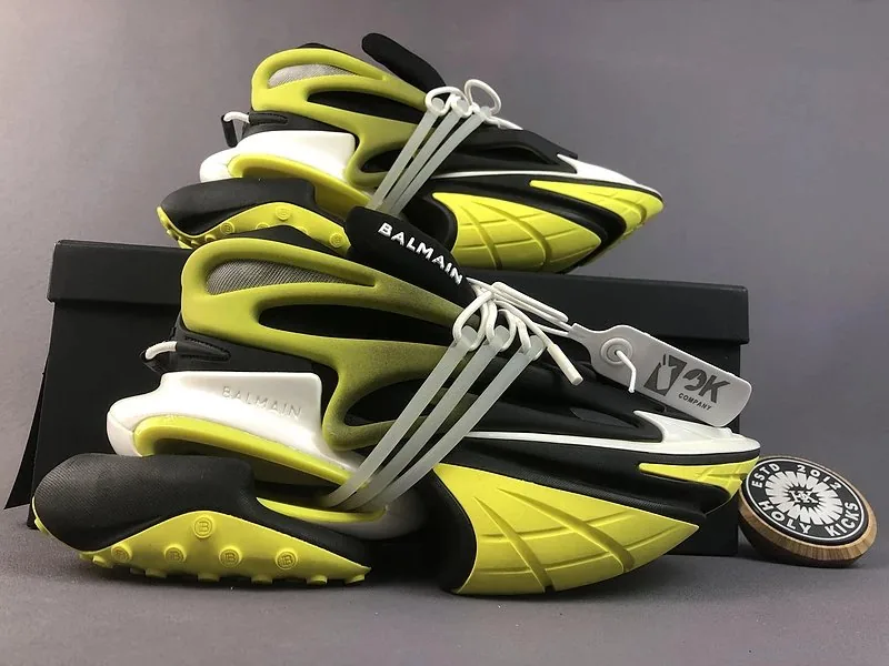 Balmain low-top sneakers in black and neon yellow