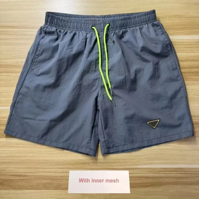 Prada Triangle Patch Shorts