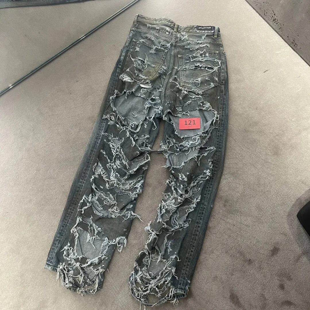 Balenciaga Washed Distressed Denim Jeans — photo 6