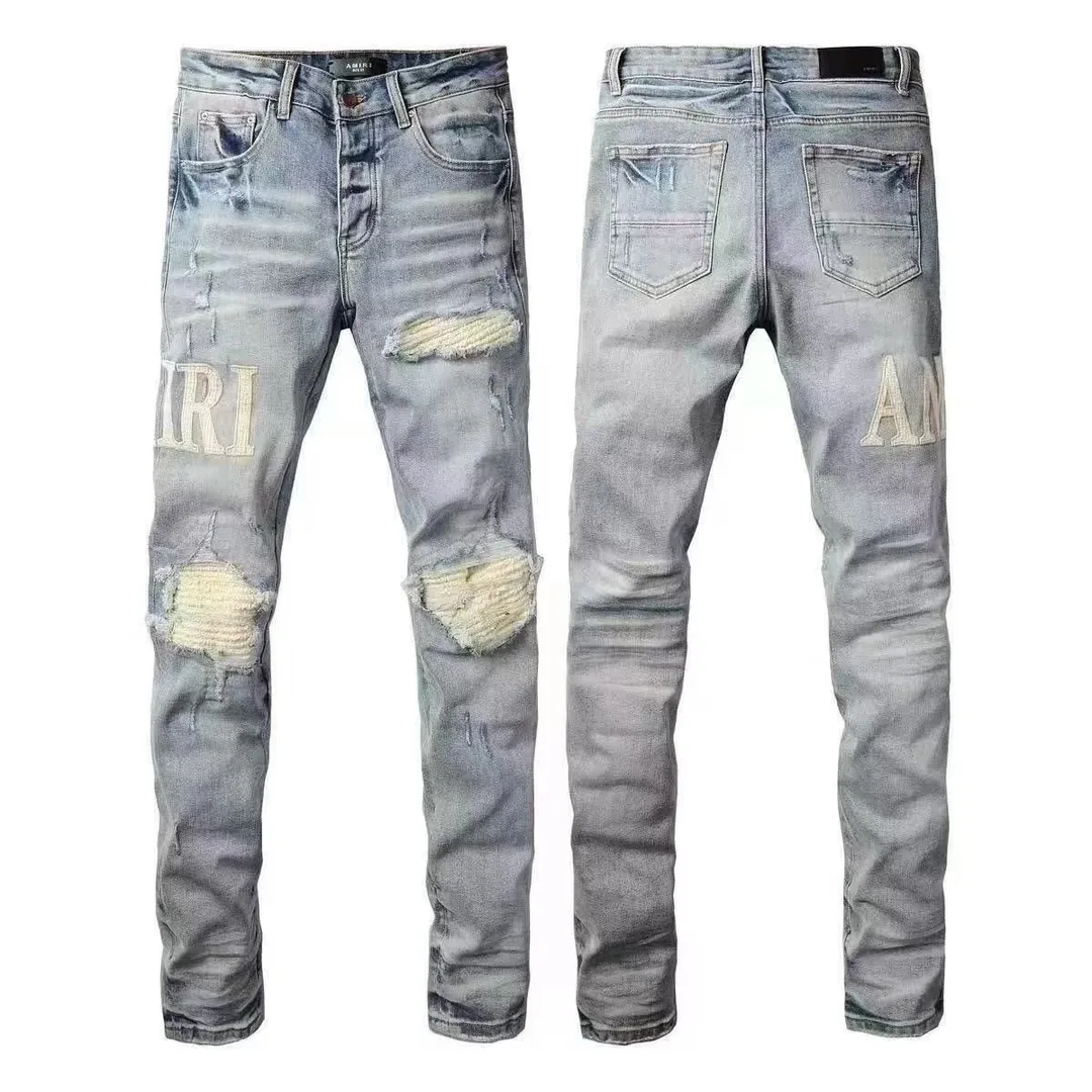 Amiri Embroidered Jeans — Photo 13