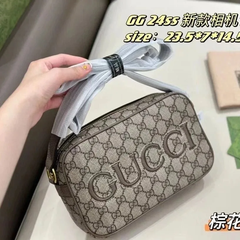 Gucci Embossed Logo Leather Camera Bag — QC