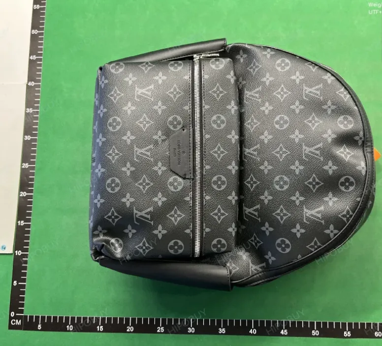 Louis Vuitton Discovery Backpack — Photo 11