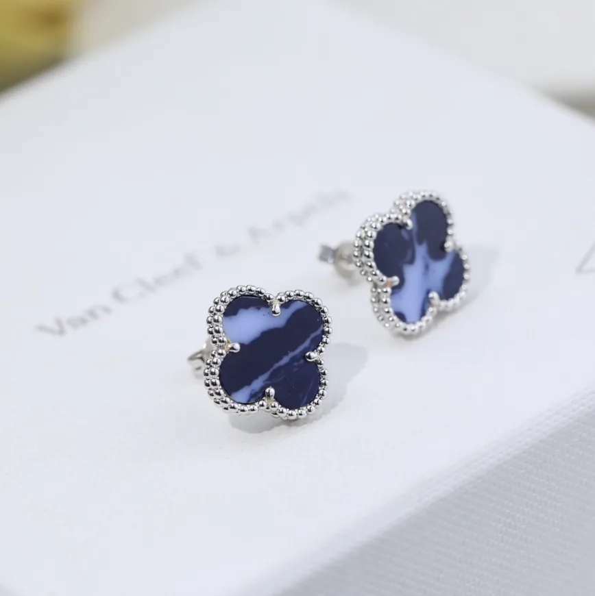 Stud Earrings — QC