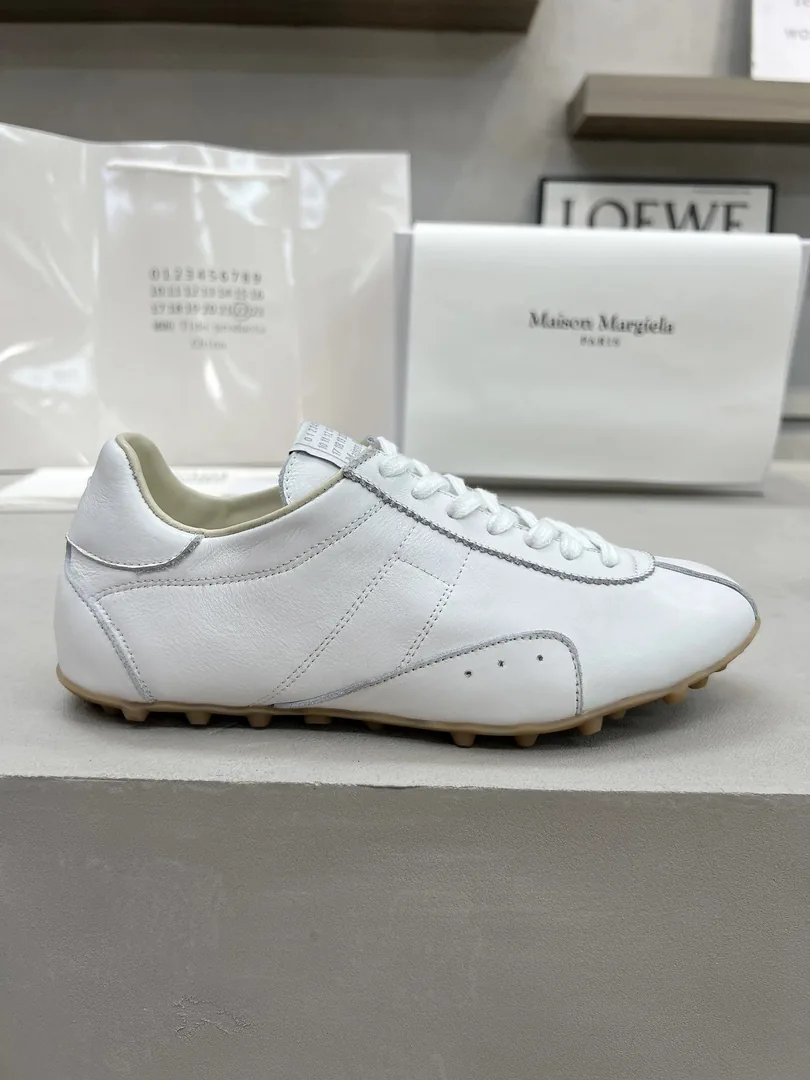 Maison Margiela Leather High-Top Sneakers — QC