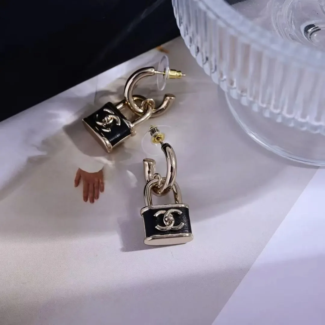 Dior Silver Pearl Star Earrings — Photo 12