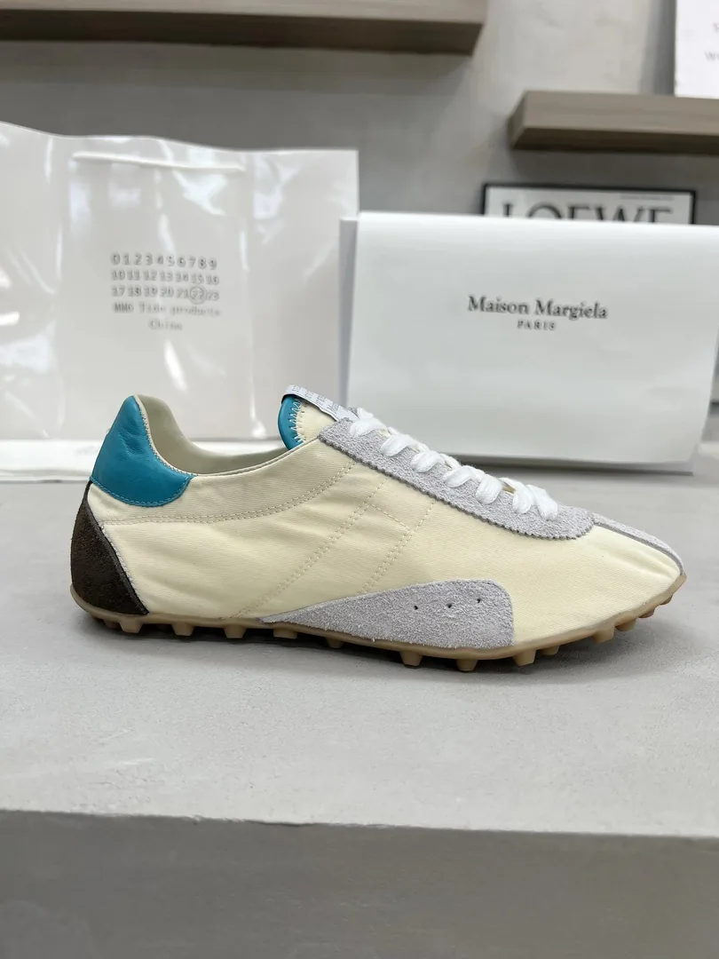 Maison Margiela Leather High-Top Sneakers — QC