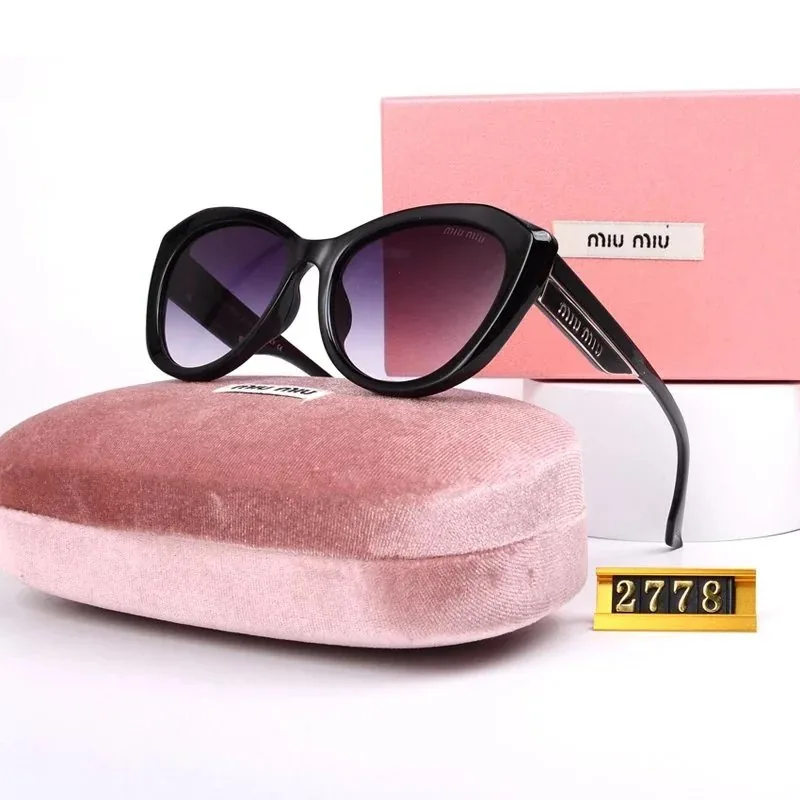 Miu Miu Sunglasses — Photo 2
