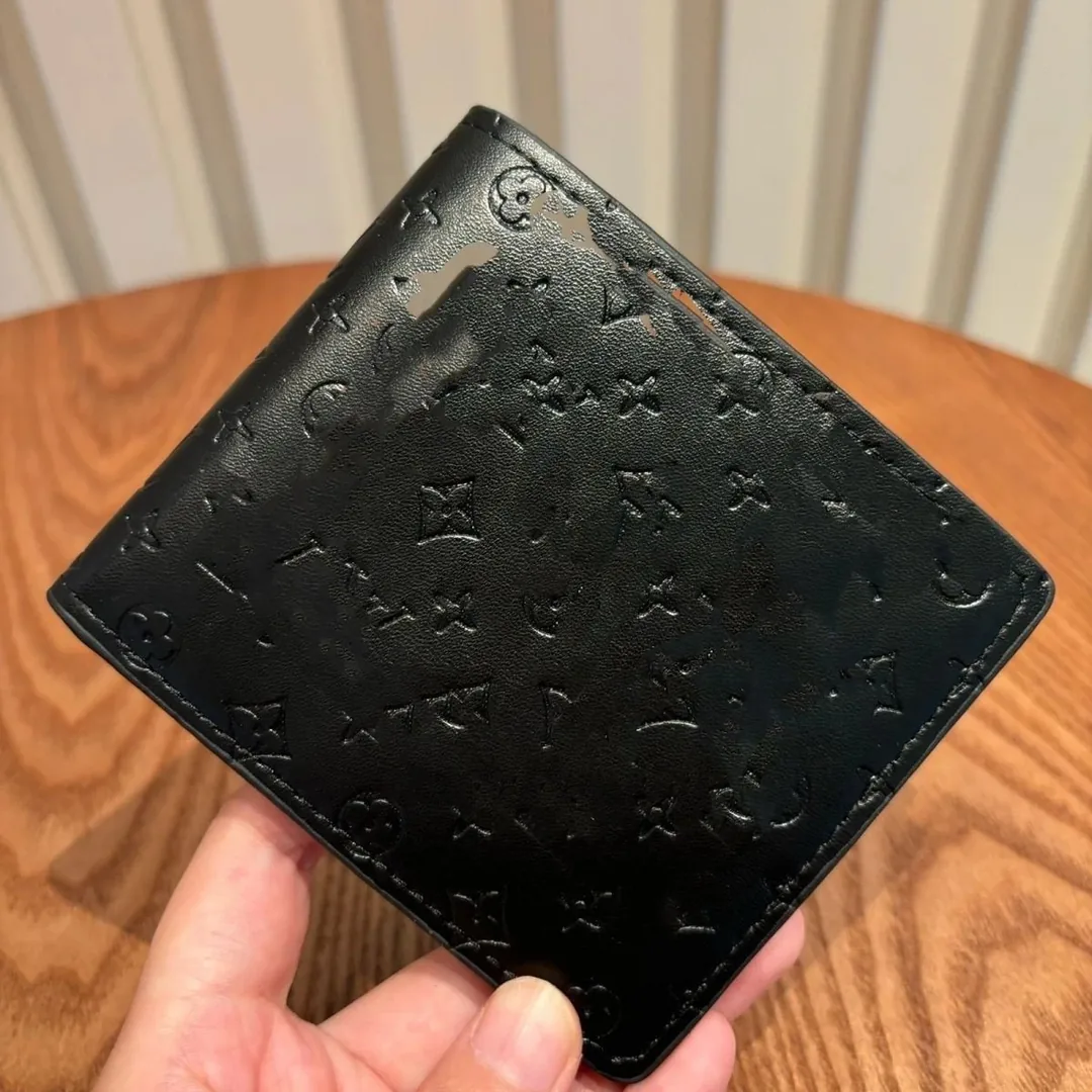 Louis Vuitton Leather Wallet — Photo 12