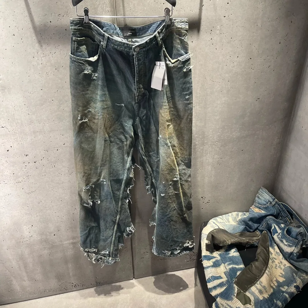 Balenciaga Washed Distressed Denim Jeans — photo 5