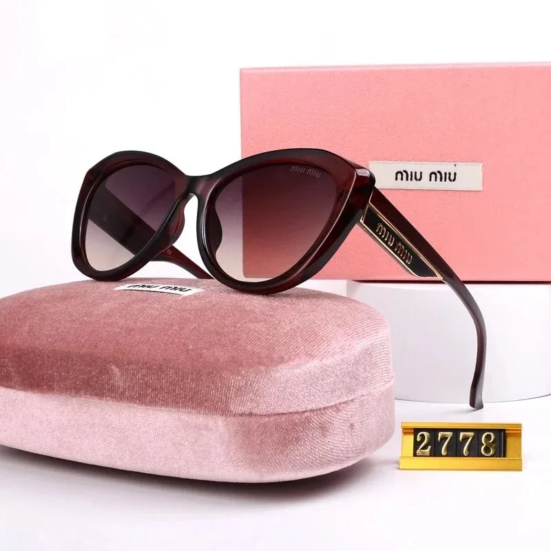 Miu Miu Sunglasses — Photo 6