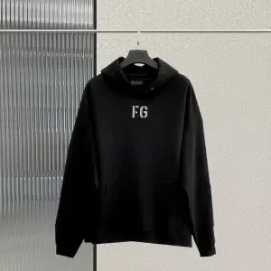 Essentials Hooded Hoodie — Photo 13