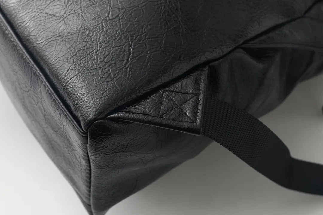 Balenciaga Logo Waxed Leather Backpack — photo 11