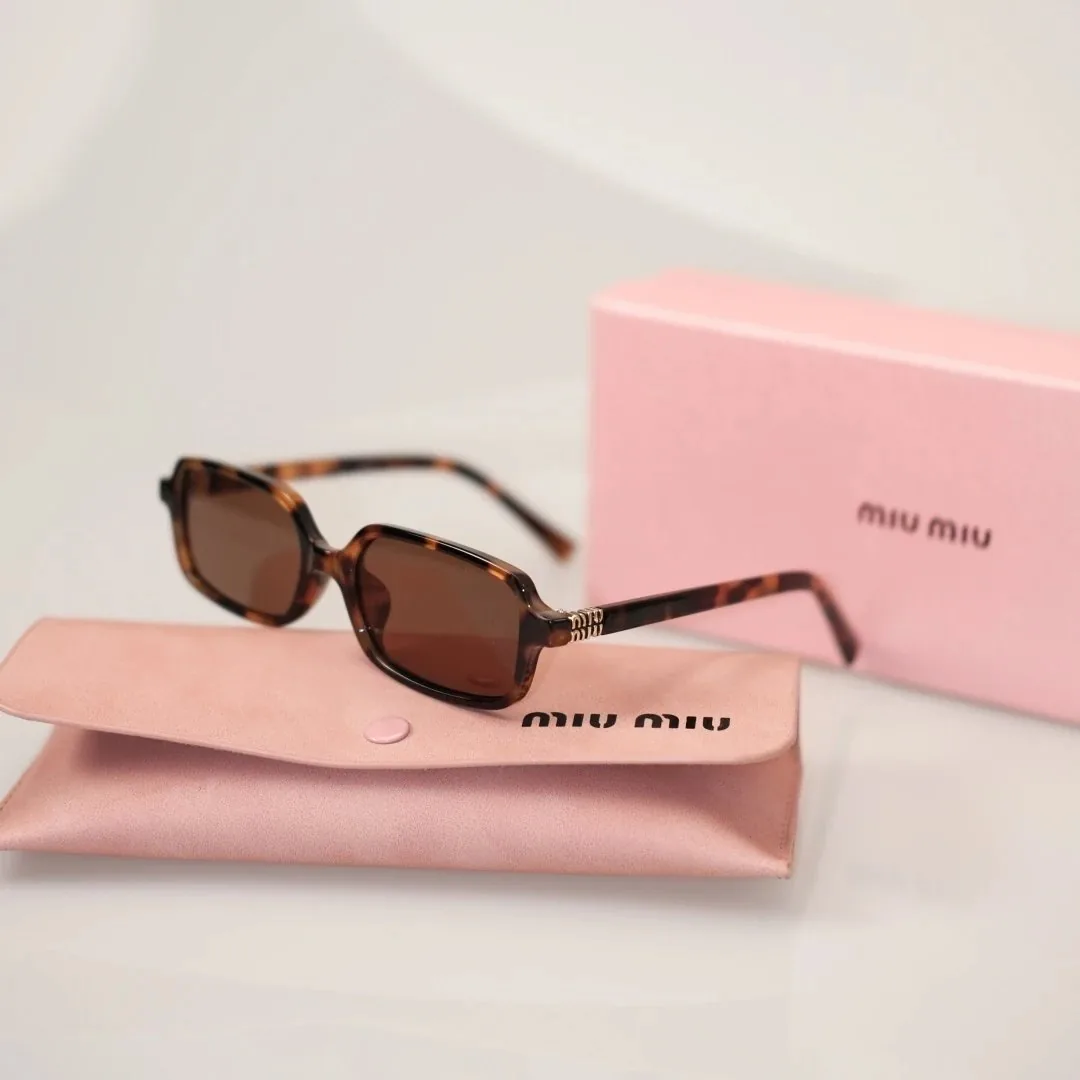 Miu Miu Sunglasses — photo 11
