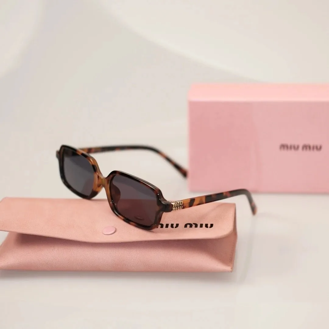 Miu Miu Sunglasses — photo 12