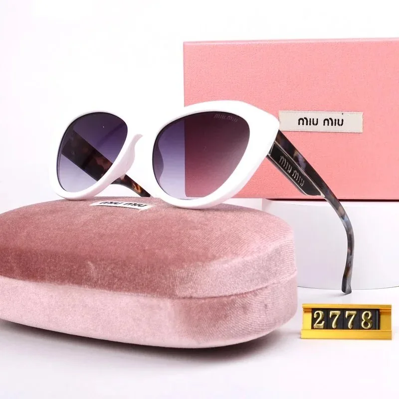 Miu Miu Sunglasses — Photo 13