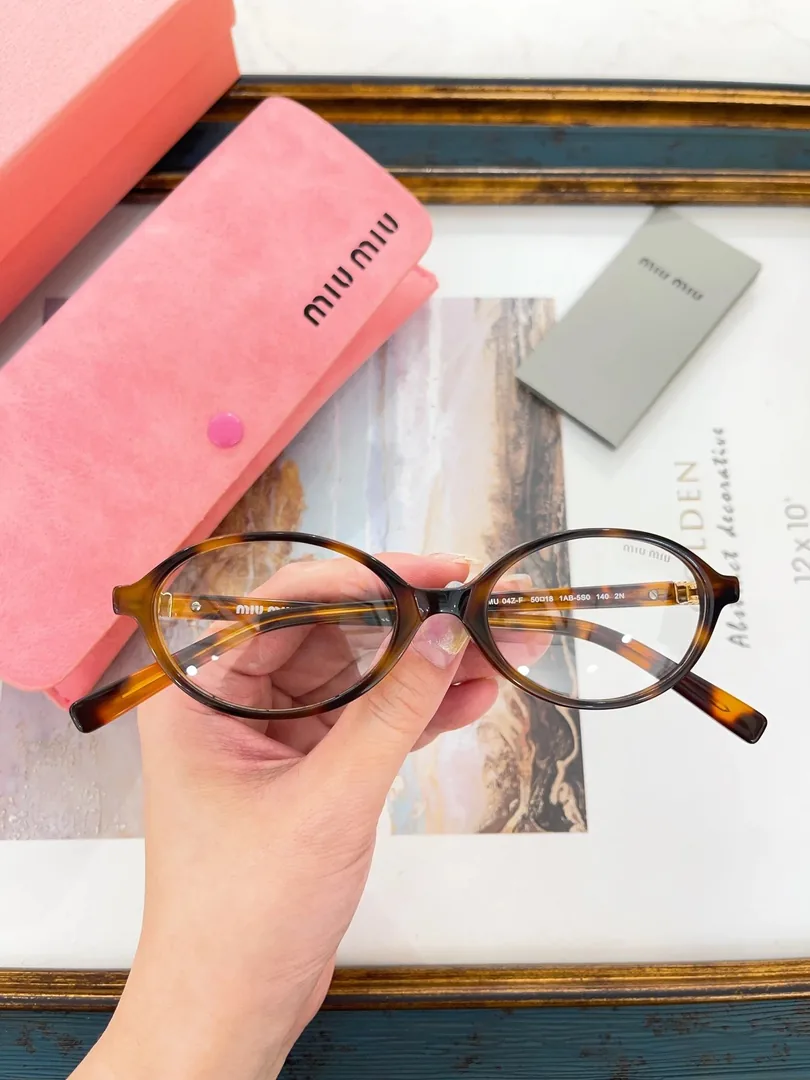 Miu Miu Round Optical Glasses — photo 3
