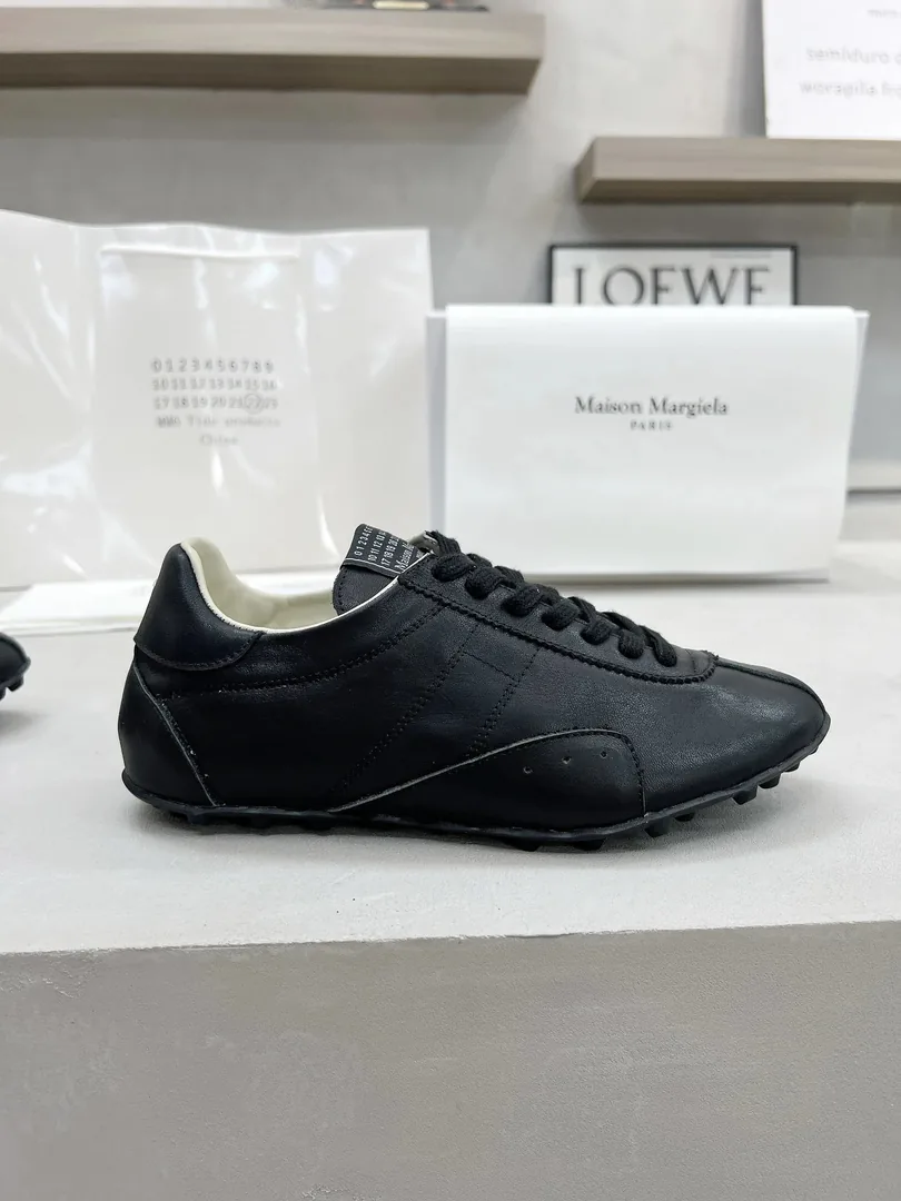 Maison Margiela Leather High-Top Sneakers — QC
