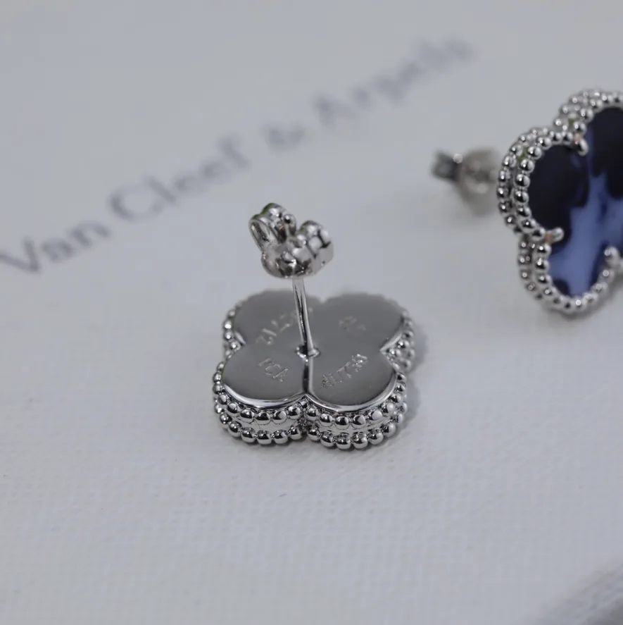 Stud Earrings — QC