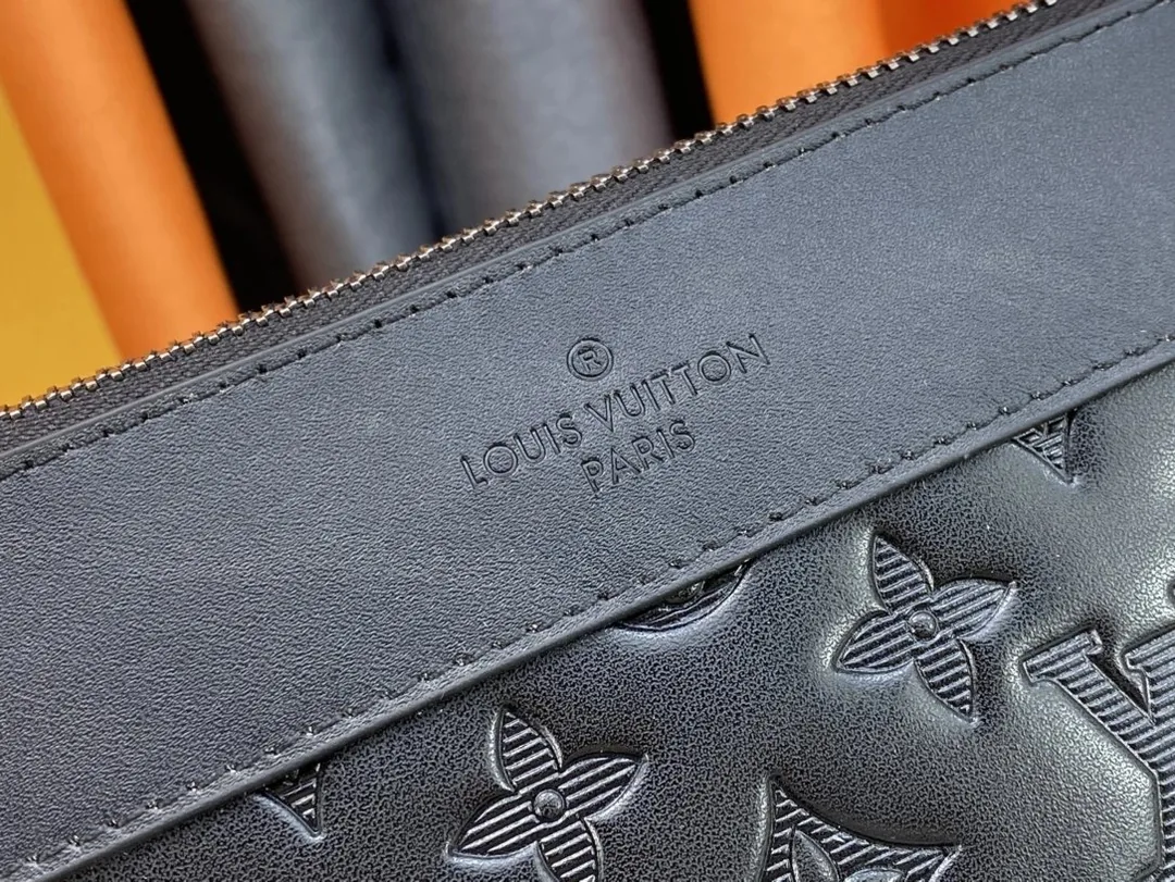 Louis Vuitton Leather Clutch — QC