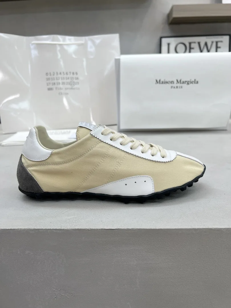 Maison Margiela Leather High-Top Sneakers — photo 11