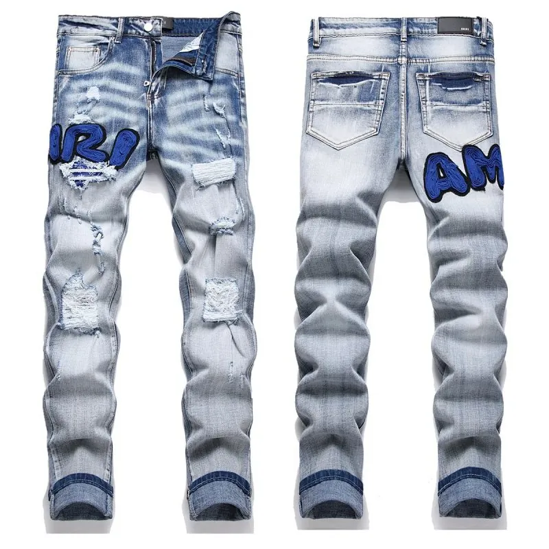 Amiri Blue Logo Light Wash Ripped Jeans